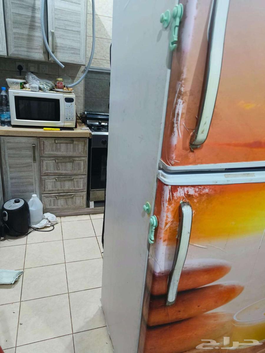 Large used refrigerator for sale with pictures showing its condition64444795315457114