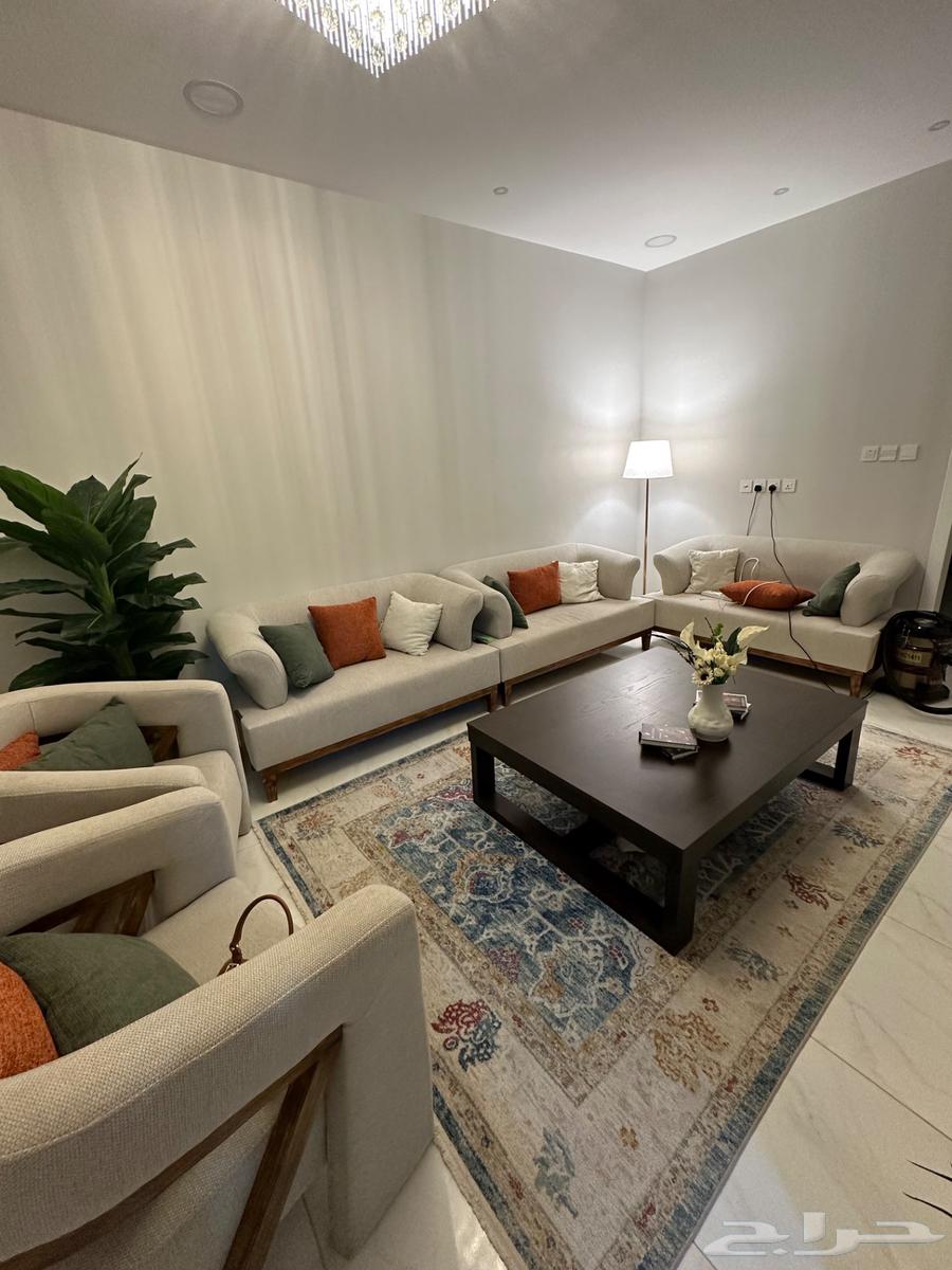 Modern almost new sofa with floor table64461431056897110