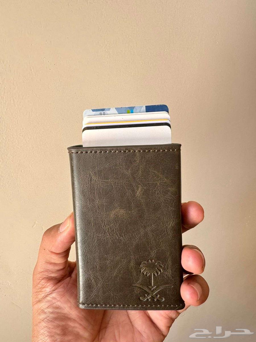 Royal wallet with luxury leather featuring royal emblem of two swords and palm tree64480758348546110