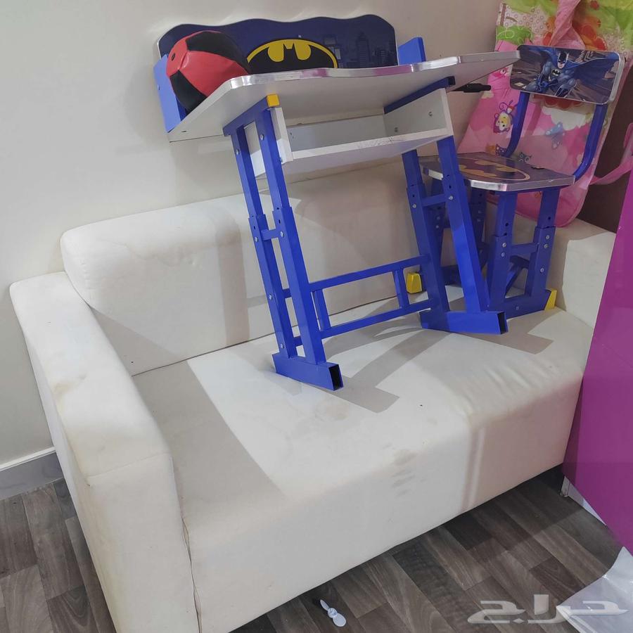 Sofa, small desk, and exercise equipment64491592016769110