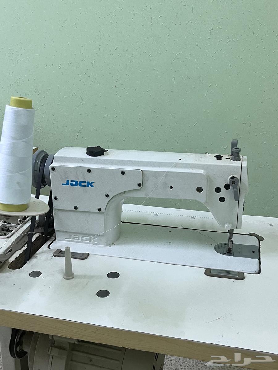 Sewing machine with table64498062564994111
