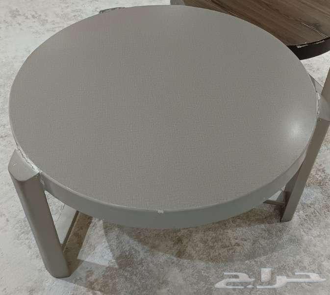 A serving table and also a cabinet approximately three meters long under the TV64505080111489113