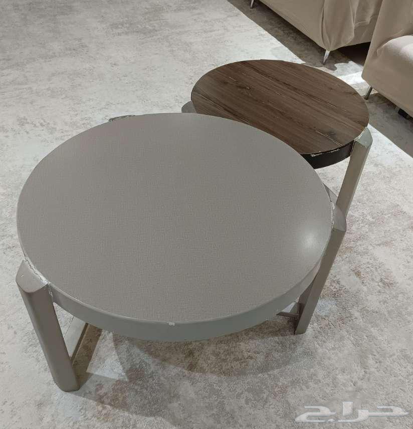 A serving table and also a cabinet approximately three meters long under the TV64505080111489110