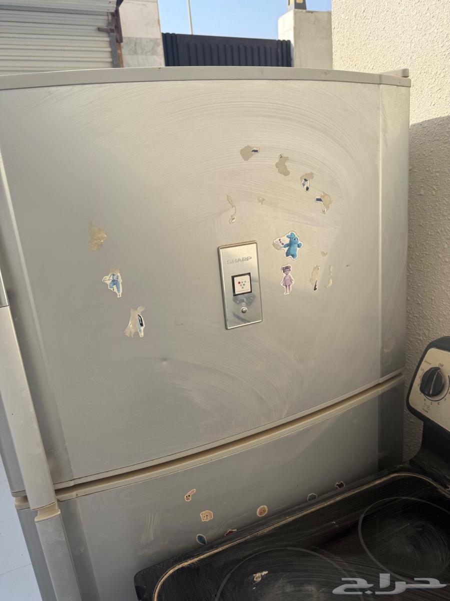 ثلاجه شارب كبيره وبوتجاز فرن للبيع64507025991171110