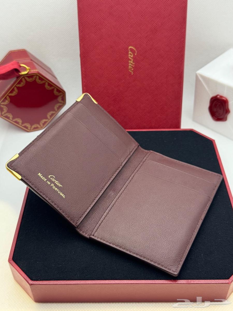 محفظة كارتير لون عنابي اصلية64503609864578111