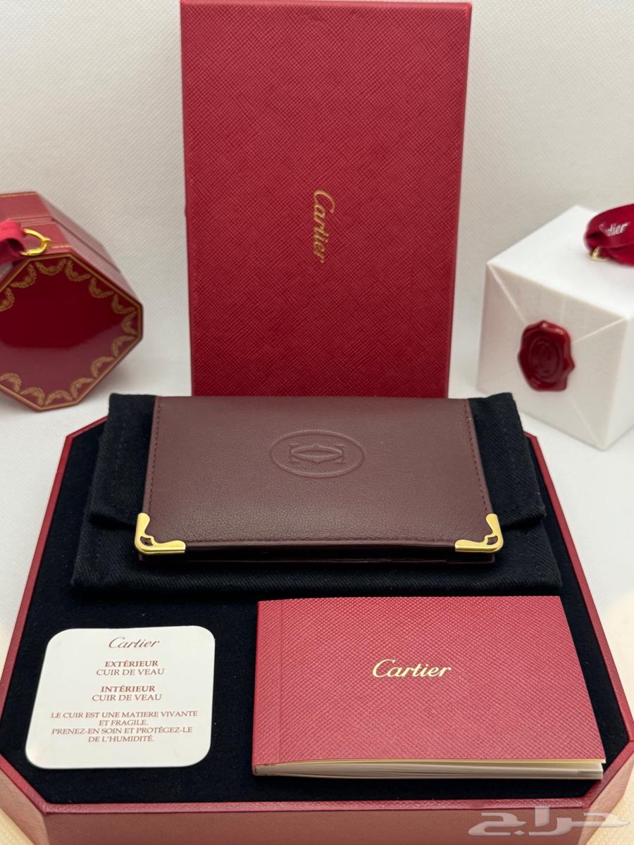 محفظة كارتير لون عنابي اصلية64503609864578110