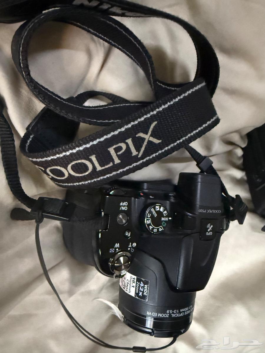 The camera shown in the image is a Nikon Coolpix64520572010371111