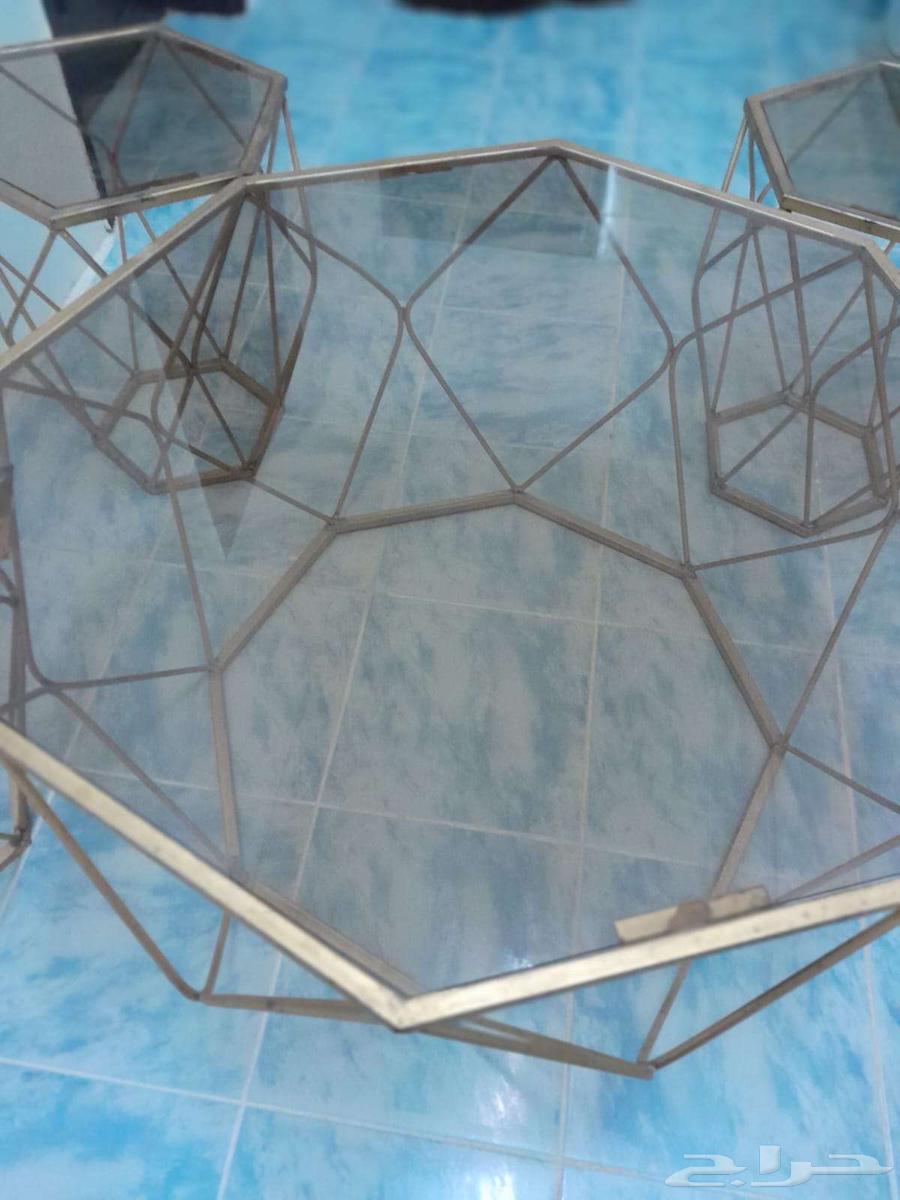 A council for sale and a table with four sofas64522245443458112