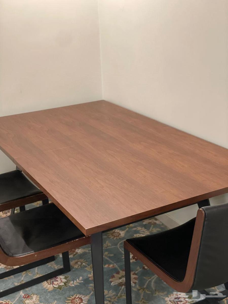 طاولة طعام شبه جديدة مكونه من 10 كراسي64532846707457110