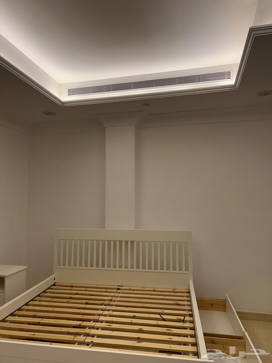 IKEA bed with storage and two side tables64553694356354112