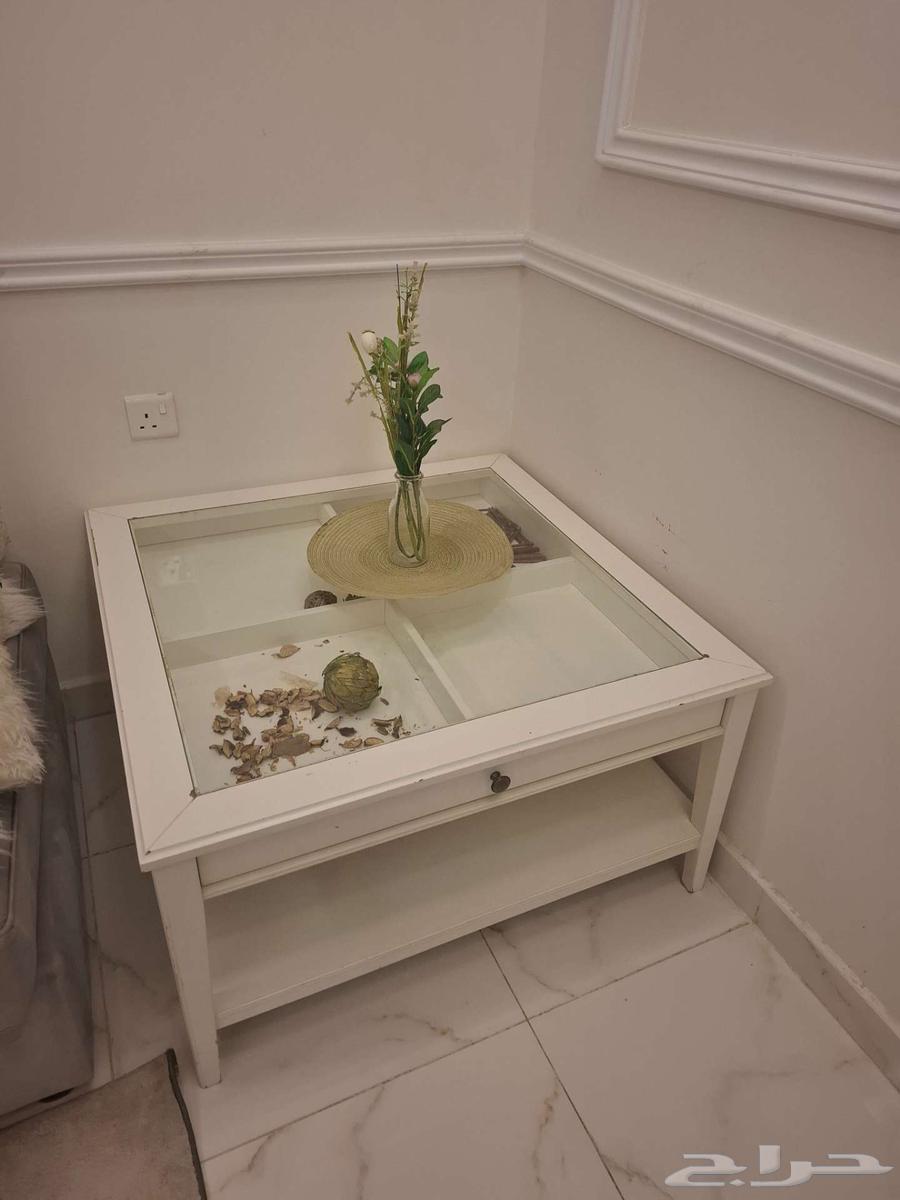 An IKEA table with some scratches64590189975810111