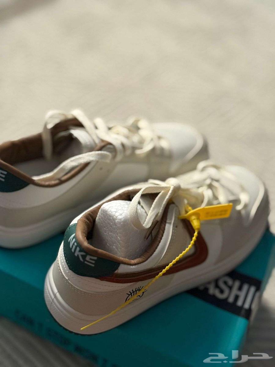 حذاء نسائي وتنورة64566092219906111