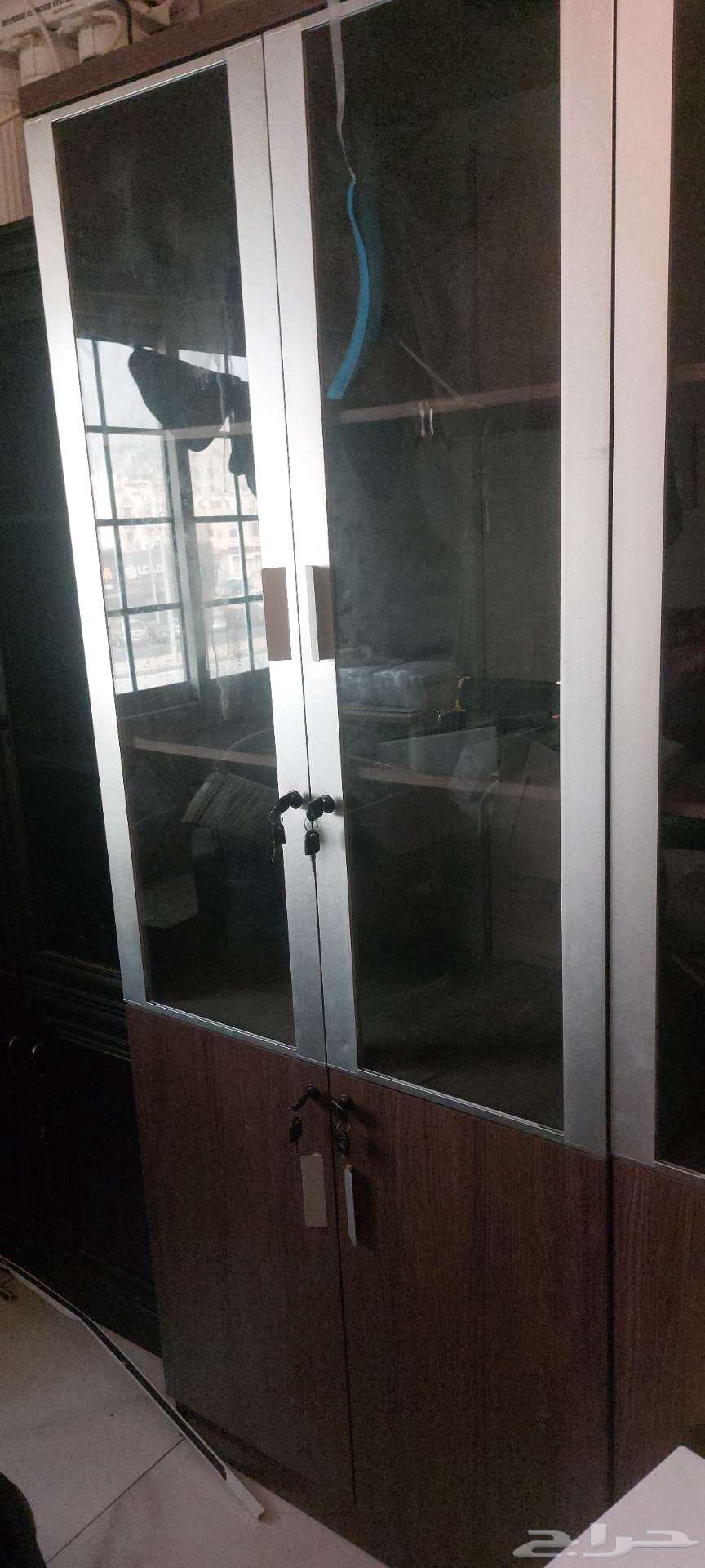 4 file cabinets, 2 desks, and 1 sofa set, all semi-new64575973438209111