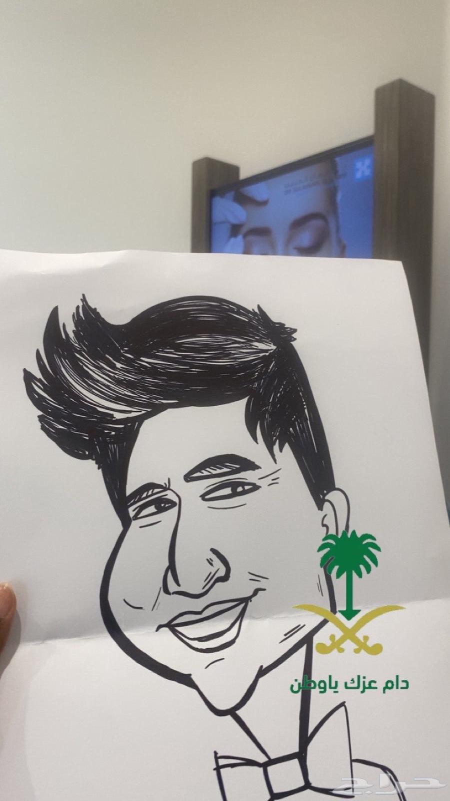 رسام رسم كاريكاتير وجرافيتي لايف مباشر للجمهور64199340706561110