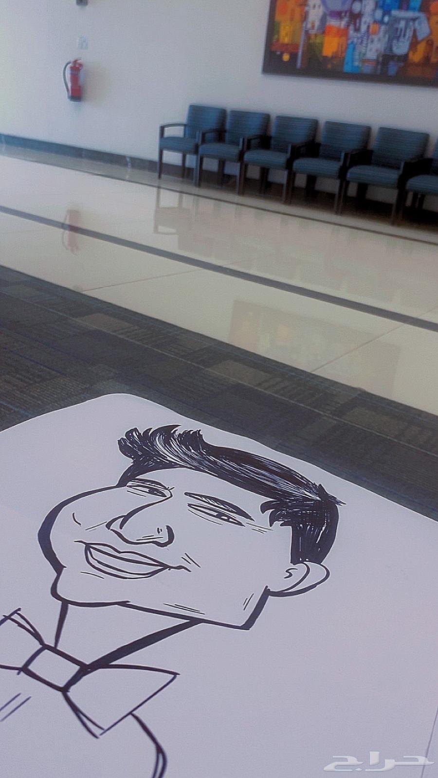 رسام رسم كاريكاتير وجرافيتي لايف مباشر للجمهور64199340706561111