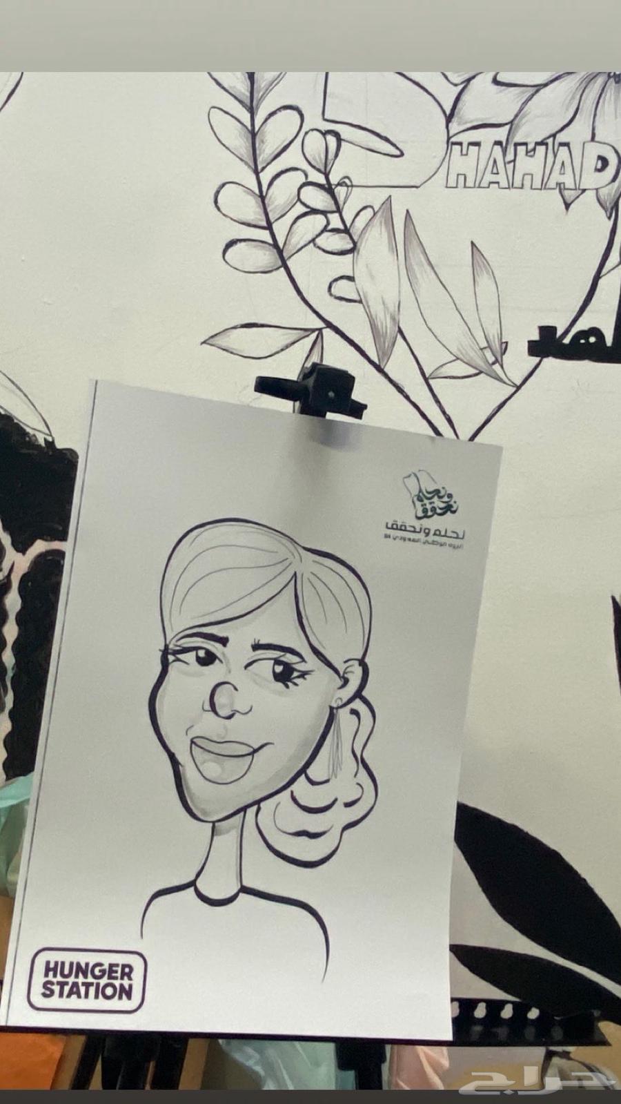 رسام رسم كاريكاتير وجرافيتي لايف مباشر للجمهور64199340706561114