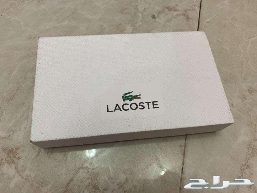 محفظة لاكوست LACOSTE مع ميدالية اصلية جديدة64426725307137110